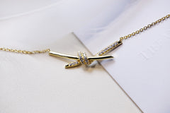 KNOT NECKLACE GOLD DIAMONDS