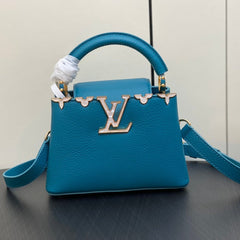 CAPUCINES MINI 21 BLUE TAURILLON GOLD HARDWARE