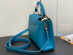 CAPUCINES BB 27 BLUE TAURILLON GOLD HARDWARE