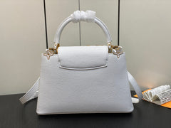 CAPUCINES MM 31 WHITE TAURILLON GOLD HARDWARE