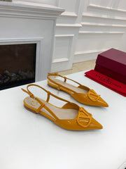 VLOGO SIGNATURE MUSTARD YELLOW PATENT LEATHER SLINGBACK PUMP
