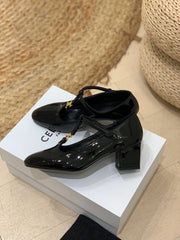 TRIOMPHE T-BAR HIGH PUMPS IN BLACK PATENT CALFSKIN