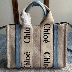 SMALL STRAP WOODY TOTE BAG 26.5 IN BEIGE LINEN CANVAS BLACK WEBBING LOGO EMBROIDER BLUE CALFSKIN