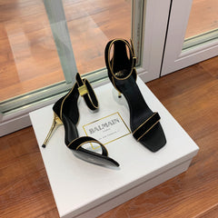 BALMAIN 25S UMA HEELED SANDALS 105MM IN BLACK SUEDE GOLD HARDWARE
