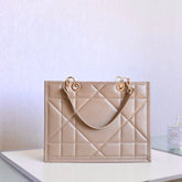 MEDIUM TOTE BOOK 26 BAG IN BEIGE CREAM CALFSKIN