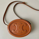 SMOOTH CALFSKIN 20 OVAL CINNAMON BROWN BAG