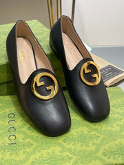 BLONDIE LOGO-PLAQUE LOAFERS IN BLACK CALFSKIN WITH GOLD HARDWARE