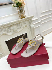 THONG SANDALS IN THISTLE PURPLE CALFSKIN WITH GOLD LOGO