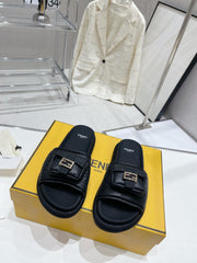 FENDI BAGUETTE SLIPPERS IN BLACK LAMBSKIN WITH GOLD HARDWARE