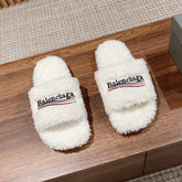 FURRY SLIDES IN WHITE CURLY SHEARLING