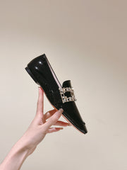 MINI BROCHE VIVIER BUCKLE LOAFERS IN BLACK PATENT CALFSKIN