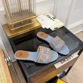 FENDI BAGUETTE SIGNATURE SLIDE IN LIGHT BLUE DENIM AND BROWN CALFSKIN