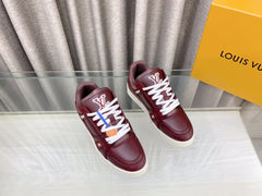 LV MAXI TRAINER IN GARNET RED CALFSKIN