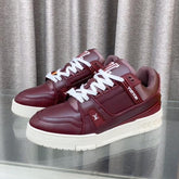 LV MAXI TRAINER IN GARNET RED CALFSKIN