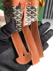 PETIT FLOT BUCKET BAG 22 IN BLACK GOYARDINE CANVAS AND TAN LAMBSKIN TRIM