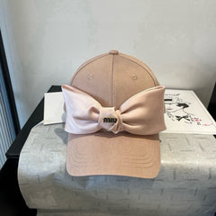 MM BASEBALL CAP IN BEIGE FABRIC WITH LARGE PINK BOW