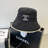 BLACK BUCKET HAT WITH FLORAL BORDER 673996