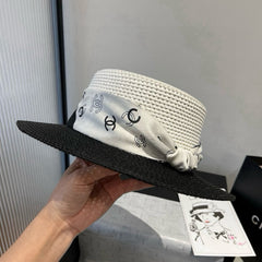 FLAT STRAW HAT BLACK AND WHITE 673935
