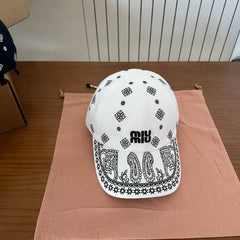MM BASEBALL CAP IN WHITE WITH BLACK EMBROIDERED PATTERN