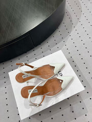 ALAIA HIGH 9 CM SLINGBACK IN WHITE PATENT CALFSKIN AND FILM