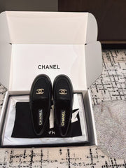 SLINGBACK LOAFER IN BLACK CALFSKIN AND SHEARLING