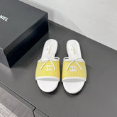 CC STRIPED SLIDE SANDALS IN YELLOW AND WHITE CANVAS