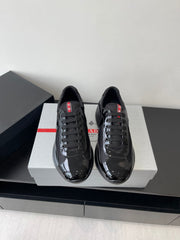 PRADA SNEAKER 25S IN BLACK MESH AND PATENT CALFSKIN