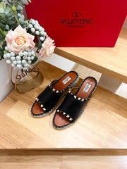 LACE-UP WEDGE SANDALS IN BLACK CALFSKIN WITH STUDS