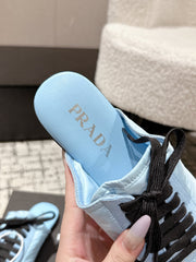 PRADA 25S DEXUN MULE IN LIGHT BLUE SUEDE LEATHER