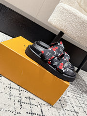 LV TWO-STRAP SLIDES 25S IN BLACK FABRIC AND CALFSKIN
