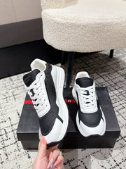 PRADA 25S MEN SNEAKERS IN BLACK AND WHITE CANVAS