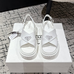 PRADA 25S CRISSCROSS SANDALS IN WHITE CALFSKIN LOGO