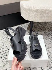 PRADA 25S CRISSCROSS SANDALS IN BLACK CALFSKIN LOGO