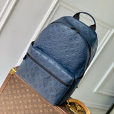 DISCOVERY PM BACKPACK 38 IN NAVY BLUE LAMBSKIN EMBOSSED MONOGRAM LOGO
