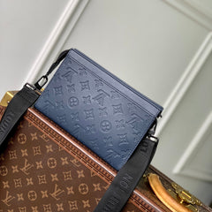 POCHETTE VOYAGE 22 IN DARK BLUE MONOGRAM SHADOW CALFSKIN