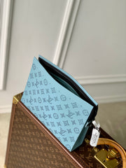 POCHETTE VOYAGE 26 IN SKY BLUE MONOGRAM ECLIPSE CALFSKIN