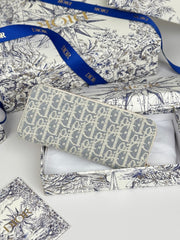 DIOR 25S LONG ZIPPER WALLET 19 IN LIGHT BLUE OBLIQUE JACQUARD CANVAS