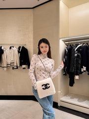 CHANEL 25S PATTERNED TURTLENECK SWEATER 380
