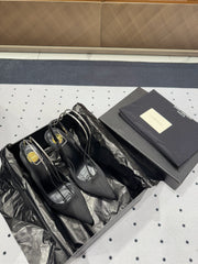 L'ENTRACTE SLINGBACK PUMPS IN BLACK SATIN