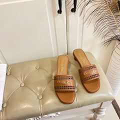 DWAY HEELED SLIDE IN BRONZE BROWN CALFSKIN WITH GOLD LOGO