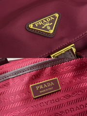 PRADA 25S RE-EDITION 1978 SMALL BACKPACK 28 IN BURGUNDY RE-NYLON