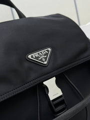 PRADA 25S EXPLORE BACKPACK 39 IN BLACK RE-NYLON AND CALFSKIN