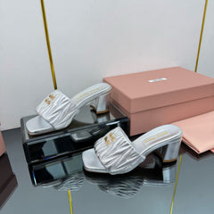 MATELASSÉ SLIDES PUMP IN SILVER PATENT CALFSKIN