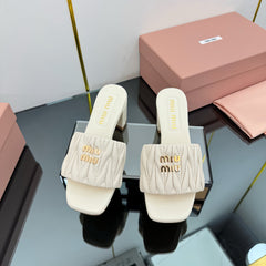 MATELASSÉ SLIDES PUMP IN OFF WHITE CALFSKIN