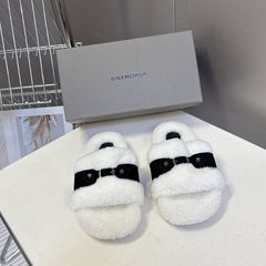 BALENCIAGA 25S SLIPPERS IN BLACK SUEDE AND WHITE WOOL