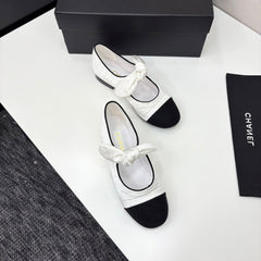 CC BALLET FLATS 25S IN WHITE AND BLACK FABRIC WITH BOW