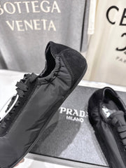 PRADA 25S COLLAPSE RE NYLON AND SUEDE SNEAKERS IN BLACK WITH METAL TOECAP