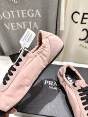 PRADA 25S COLLAPSE RE NYLON AND SUEDE SNEAKERS IN LIGHT PINK WITH METAL TOECAP