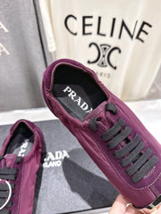 PRADA 25S COLLAPSE RE NYLON AND SUEDE SNEAKERS IN PLUM WITH METAL TOECAP