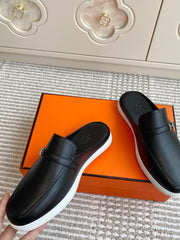 HM 25S MULES IN BLACK LAMBSKIN WITH SILVER HARDWARE